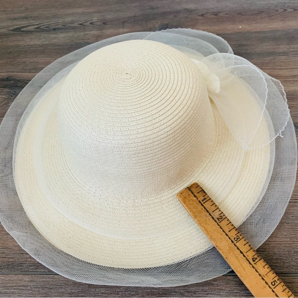 Elegant Cream Wide-Brim Hat with Floral Accent - Picture 6 of 9